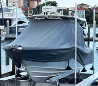 Photo of Grady White Freedom 235, 2024: LaPorte&trade; T-TopCover TTopCover&trade; T-Top boat cover on lift, viewed from port front from RnR-Marine&trade; 