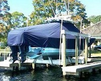 Photo of Regulator 34 20xx TTopCover™ T-Top boat cover on Lift, viewed from Starboard Rear  (Factory OEM) 