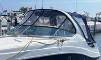 Photo of Factory OEM Rinker 290 Express, 2020: Arch Connector, Side Curtains, Camper Top, Camper Side Curtains, port front   