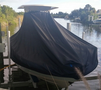 Photo of Robalo 246 Cayman 20xx LaPorte&trade; T-TopCover TTopCover&trade; T-Top boat cover on lift, front from RnR-Marine&trade; 