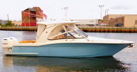 Photo of Scout 275 Dorado, 2015: Hard-Top, Connector, Side Curtains, Aft-Drop-Curtain, viewed from Starboard Side 