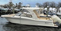 Photo of Scout 275 Dorado, 2020 Hard-Top, Connector, Side Curtains, Bow Cover, viewed from port side 