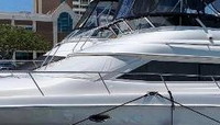 Photo of Sea Ray 450 Express Bridge, 2001: Bimini Enclosure WindShield Cover, viewed from port front  (Factory OEM) 