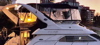 Photo of Sea Ray 450 Express Bridge, 2003: Bimini Top Bridge Bimini Full Enclosure Aft Sunshade Top, viewed from Starboard Rear  (Factory OEM) 