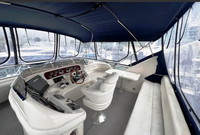 Photo of Sea Ray 450 Express Bridge, 2003: Bimini Top Bridge Bimini Full Enclosure, front, viewed from starboard and Aft, inside  (Factory OEM) 