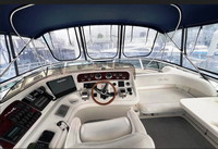 Photo of Sea Ray 450 Express Bridge, 2003: Bimini Top Bridge Bimini Full Enclosure, viewed from port front, viewed from starboard, inside  (Factory OEM) 