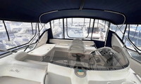 Photo of Sea Ray 450 Express Bridge, 2003: Bimini Top Bridge Bimini Full Enclosure, viewed from starboard Aft, viewed from port, inside  (Factory OEM) 