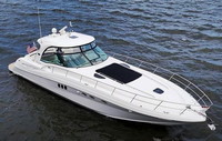 Photo of Sea Ray 52 Sundancer, 2006: Hard-Top, Visor and Side Curtains SunPad, viewed from Starboard Front 