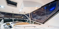 Photo of Factory OEM Sea Ray 540 Cockpit Motor Yacht, 2001: Bridge Hard-Top Full Enclosure, inside, front, starboard   