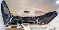 Photo of Factory OEM Sea Ray 540 Cockpit Motor Yacht, 2001: Bridge Hard-Top Full Enclosure, inside, front   