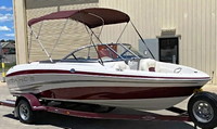 Photo of Tahoe Q5i No Tower, 2009: Bimini Top Burgundy ClimaShield Plus, viewed from Starboard Front 