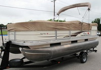 Photo of Tracker Sun Tracker Party Barge 18, 2006: Aft Bimini Top in Boot Aft Bimini Mooring-Cover, viewed from Port Front 