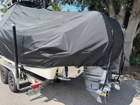 Photo of Wellcraft Scarab 242, 2019 TTopCover™ T-Top boat cover, viewed from port rear  (Factory OEM) 