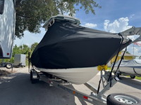 Photo of Wellcraft Scarab 242, 2019 TTopCover™ T-Top boat cover, viewed from Starboard Front  (Factory OEM) 